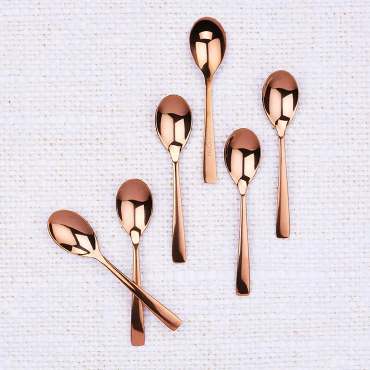 6 Petites cuillères Oglu cuivrées