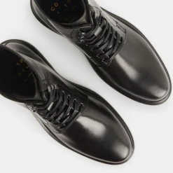 Boots à lacets semelle épaisse noires