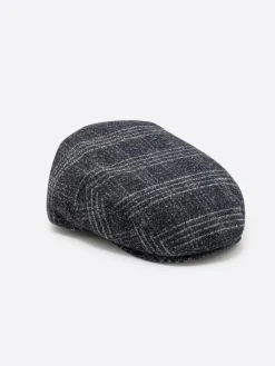 Casquette plate à carreaux bleu marine