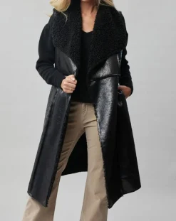Manteau sans manches en fausse peau lainée Vogue noir