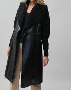 Manteau sans manches en fausse peau lainée Vogue noir