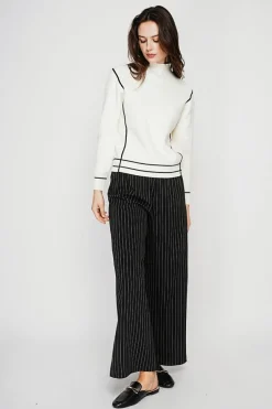 Pull col roulé montant naturel