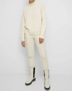 Pull en Laine bouclée col cheminé écru